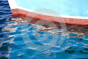 Bow and its reflection in the sea