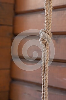 Bow knot made of linen rope string isolated over the background