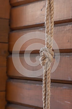 Bow knot made of linen rope string isolated over the background