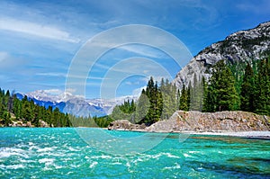 Bow River in Banff National Park With Canadian Rockies in Background photo