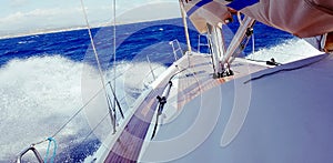 Bow of sailboat in waves