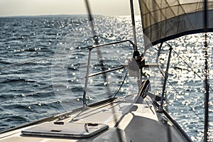 Sailing into the sunset on a sailing yacht