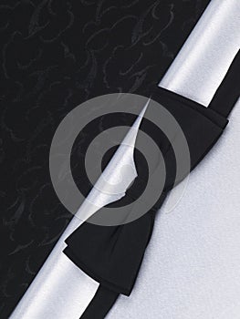 Bow tie on a black and white silk