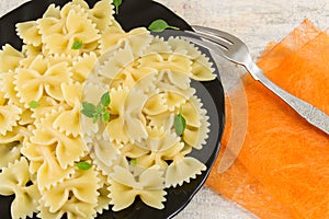 Bow tie farfalle pasta served on a plate