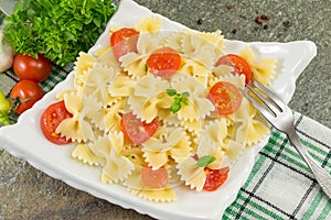 Bow tie farfalle pasta served on a plate