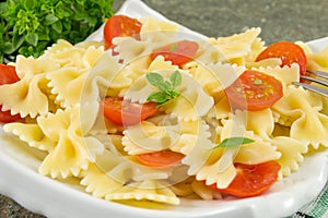 Bow tie farfalle pasta served on a plate