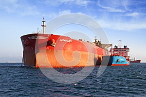 Bow view of bulk carrier ship Leonid Loza anchored in Algeciras bay in Spain.