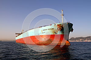 Bow view of bulk carrier ship Maersk Privilege anchored in Algeciras bay in Spain.