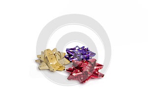 Red, beige and violet Bow on the white