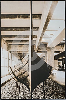 Bow of wreck of wooden Viking boat in Roskilde museum, Denmark, lith print.