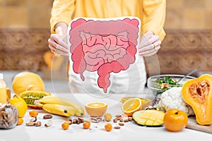 Bowel model and variety of healthy fresh food