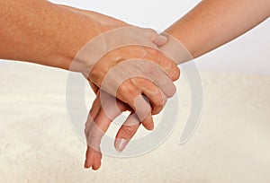 Bowen massage treatment of a hand photo