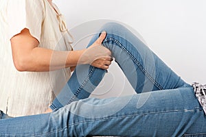 Bowen therapy - massage treatment of a leg photo