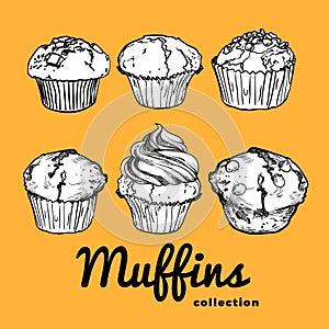 Black and white muffins on orange background