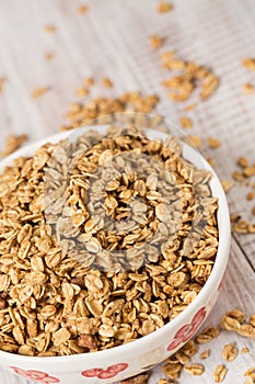 Bowl Of Almond Breakfast Granola Close Up Vertical