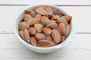 Bowl of Almonds on White Background