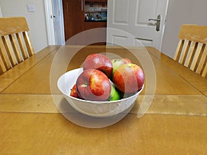 Bowl of Apples on kitchen table