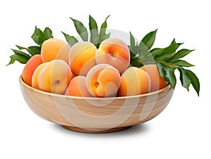 Bowl with appricots and green leaves