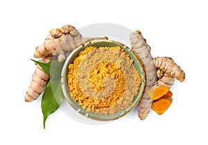 Bowl of aromatic turmeric powder, leaves and raw roots isolated on white, top view