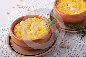 Bowl of baked polenta with cheese