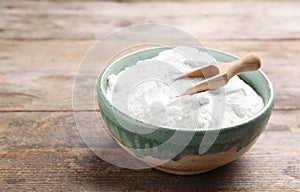 Bowl with baking soda and scoop