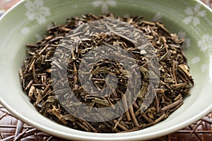 Bowl with Bancha Houji Cha, Japanese roasted tea close up