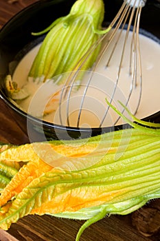 Bowl With Batter And Zucchini Flowers