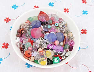 Bowl of beads and buttons
