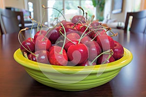 Bowl of Bing Cherries on Dining Table photo