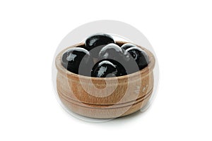 Bowl of black olives isolated on white background