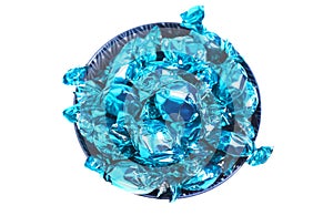 A Bowl of Blue Wrapped Candy on a White Background