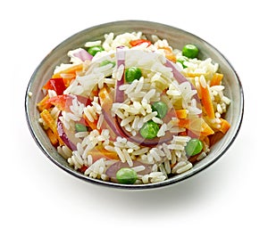 Bowl of boiled rice with vegetables
