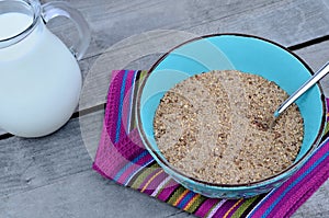 Bowl with bran and milk