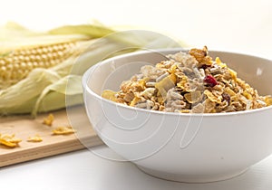 Bowl of Breakfast Cereal and Corn Cob.