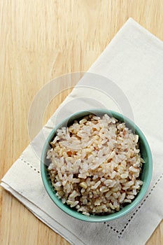 The bowl brown Rice on napkin