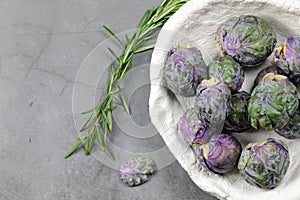 A Bowl of Brussels Sprouts on grey background