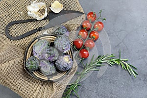 A Bowl of Brussels Sprouts on grey background