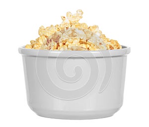 Bowl of buttery popcorn isolated photo