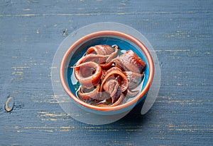 Bowl of canned anchovy fillets