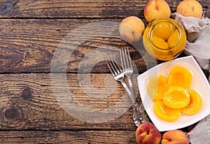 Bowl of canned peaches