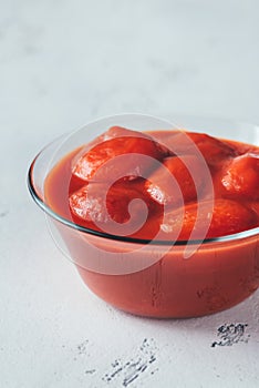 Bowl of canned tomatoes