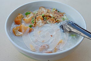 A bowl of Cantonese Ting Zai porridge or congee, commonly eaten during breakfast in SE Asia
