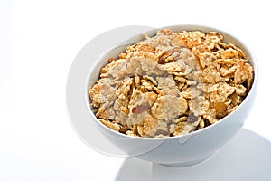 Bowl of cereal with raisins and milk