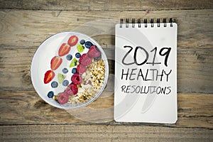 Bowl of cereal with text of 2019 healthy resolutions