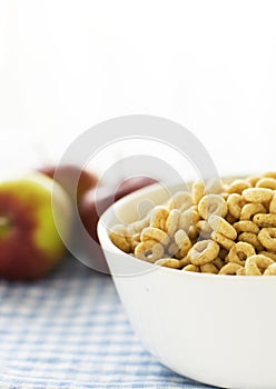 Bowl with cereals and apples