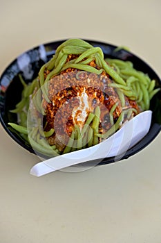A bowl of Chendol (Cendol) - an iced-sweet dessert found commonly in Southeast Asia