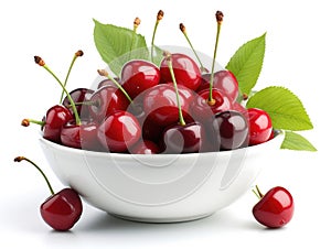 Bowl with cherries and green leaves