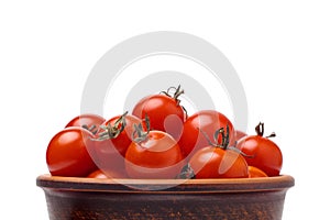 Bowl with cherry tomatoes on white background close up