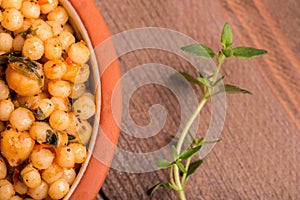 Bowl of chickpeas with herbs