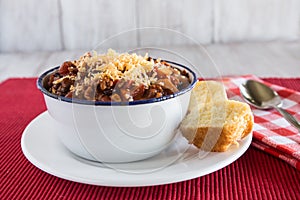 Bowl of Chili Comfort Food With Corn Bread Muffin